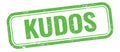 KUDOS text on green grungy vintage stamp Royalty Free Stock Photo