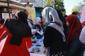 Kudus, December 2022. Photo of food and beverage vendors on the side of the road selling to a crowd of visitors and buyers in the