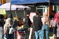 Kudus, December 2022. Photo of food and beverage vendors on the side of the road selling to a crowd of visitors and buyers in the