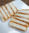 Kue Pancong or Kue Bandros or Kue Gandos, an Indonesian Street Food Snack Royalty Free Stock Photo