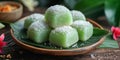 Kueh bahulu in dish on the table Royalty Free Stock Photo