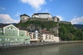 Kufstein fortress on a hilltop over river