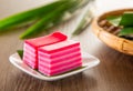 Kuih lapis is a traditional Malay nyonya sweet desert on wooden table Royalty Free Stock Photo