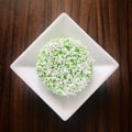 A Kuih Lopes on a white rhombus plate. Copy space.