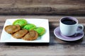 Kuih Pinjaram and a cup of coffee Royalty Free Stock Photo