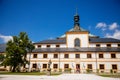 Kuks, East Bohemia, Czech Republic, 10 July 2021: Baroque castle and hospital Kuks, courtyard with antique sundial on the facade,