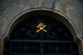 Kuks, East Bohemia, Czech Republic, 10 July 2021: Baroque castle and hospital Kuks at summer day, Golden Skull symbol deaths head