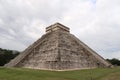 The Kukulcan Pyramid, El Castillo, The Castle at Chichen Itza, View on the intact front and its destroyed side, close to