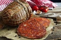 Kulen. Croatian spicy sausage on wooden board Royalty Free Stock Photo