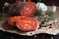 Kulen. Croatian spicy sausage on wooden board Royalty Free Stock Photo