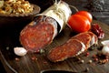 Kulen. Croatian spicy sausage on wooden board Royalty Free Stock Photo