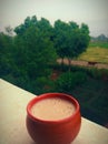 A Kulhad of coffee in stormy weather Royalty Free Stock Photo