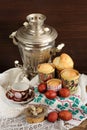Kulichi, traditional Russian easter cakes with samovar, dyed egg