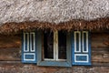 Thatched wooden house in an open-air museum. Royalty Free Stock Photo