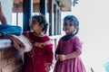 Kullu, Himachal Pradesh, India - August 31, 2018 : Photo of twins girl near her house in himalaya Royalty Free Stock Photo