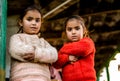 Kullu, Himachal Pradesh, India - December 21, 2018 : poor indian Twins girl child in mountains