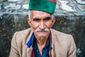 Kullu, Himachal Pradesh, India - September 01, 2018 : Portrait of himachali Old Man on the street in Himalayan village Royalty Free Stock Photo