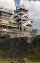 Kumamoto Castle covered in scaffolding undergoing earthquake damage repair to its stone walls