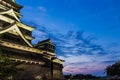 Kumamoto Castle at night in Kumamoto, Kyushu, Japan.