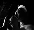 Kumartuli,West Bengal, India, July 2018.An artisan working on A clay idol of Goddess Durga at a shop during night. Durga puja is t Royalty Free Stock Photo