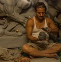 Kumartuli,West Bengal, India, July 2018. A clay idol of Goddess Durga under construction at a shop during night. Durga puja is the