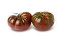 Kumato tomatoes isolated on a white background with a clipping path