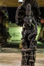 Stone sculpture of a goddess inside a temple