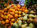 Kumquats and pears in market Royalty Free Stock Photo