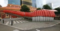 Red scaled and paneled facade in undulation of Kumutoto Toilet on Synergy Plaza on Queens Wharf, Wellington CBD, New Zealand Royalty Free Stock Photo