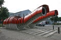 Red scaled and paneled facade in undulation of Kumutoto Toilet on Synergy Plaza on Queens Wharf, Wellington CBD, New Zealand Royalty Free Stock Photo