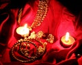 Kundan jewelry in red background in candle light