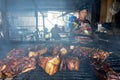 Vendor preparing a barbecue wild boar,