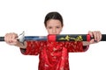 Kung fu girl takes out sword Royalty Free Stock Photo