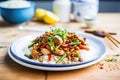 kung pao chicken over white rice on a plate Royalty Free Stock Photo