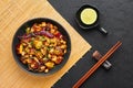 Kung Pao Paneer at black slate background. Kung Pao Paneer is a vegetarian version of chinese dish Gong Bao. Indian Food