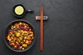 Kung Pao Paneer at black slate background. Kung Pao Paneer is a vegetarian version of chinese dish Gong Bao. Indian Food