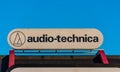 Audio-technica sign on top of a building..