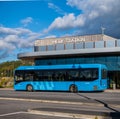 Blue electric bus waiting at Hede Station.. Royalty Free Stock Photo
