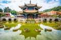 Yuantong Buddhist temple wide angle view of the octagonal pavilion with water reflection in Kunming Yunnan China