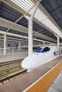 High-speed train departs from the station. Royalty Free Stock Photo