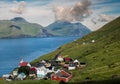 Kunoy village with red church with ocean in backgroud and clloudy sky