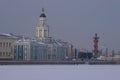 Kunstkammer and South Rostral Column in the February twilight. Saint-Petersburg, Russia Royalty Free Stock Photo