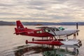 Kununurra, WA. Australia - May 18, 2013: A Cessna 208 Caravan Amphibious Float plane lands on the still waters of Lake Argyle