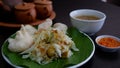 Kupat Tahu is made from fried ketupat, tofu, cabbage and bean sprouts, mixed with peanut sauce and soy sauce. Royalty Free Stock Photo