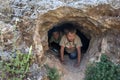 Kurdish boys exploring a cave.