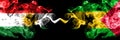 Kurdistan vs Sao Tome and Principe smoke flags placed side by side. Thick colored silky smoke flags of Kurds and Sao Tome and