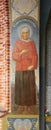 Kuremae, Estonia - 27 July 2018: St. Xenia of St. Petersburg Icon in the arch of The Saint Gate with belfry. Puhtitsa