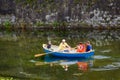 Kuressaare, ESTONIA, 2018, 14 of July: Family rowing boat in castle moat near medieval wall