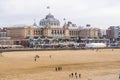 The Kurhaus along the boulevard with in front the beach of Scheveningen in the Netherlands Royalty Free Stock Photo