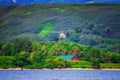 Kurile lake. Kamchatka. Russia. Green fields and volcanoes. Wild nature